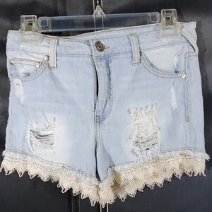 Elan distressed lace denim shorts